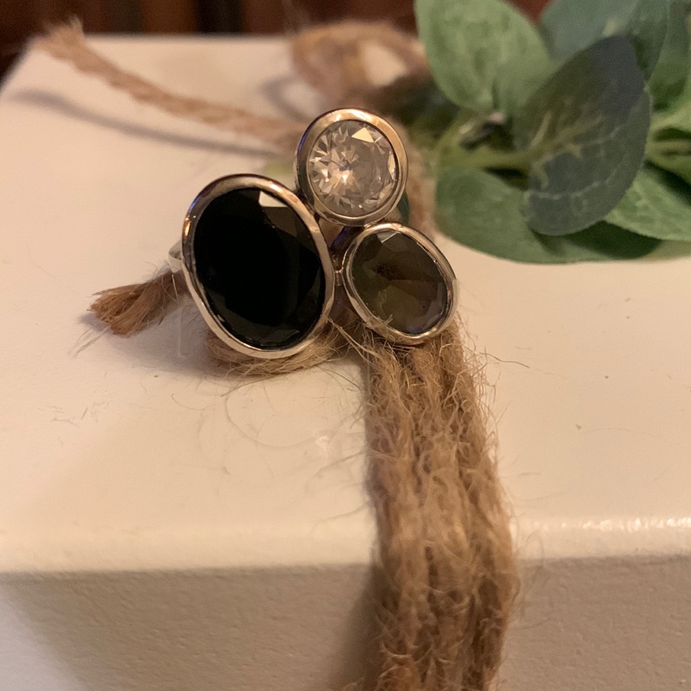 Beautiful three stoned silver ring. Decorative jewelry!